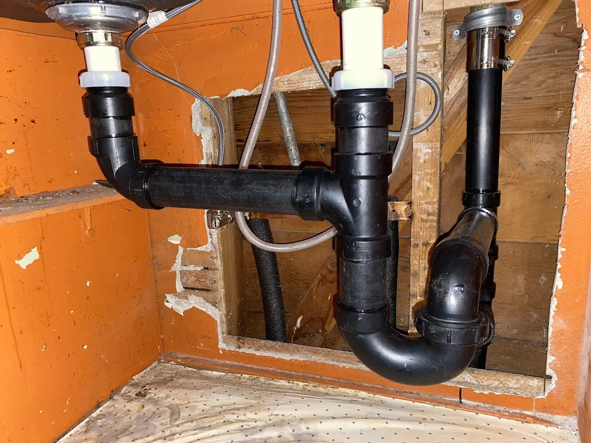 Professional Garbage Disposal Repair equipment and tools on the job in Lake Darby